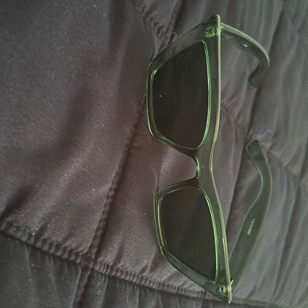 dark green sunglasses